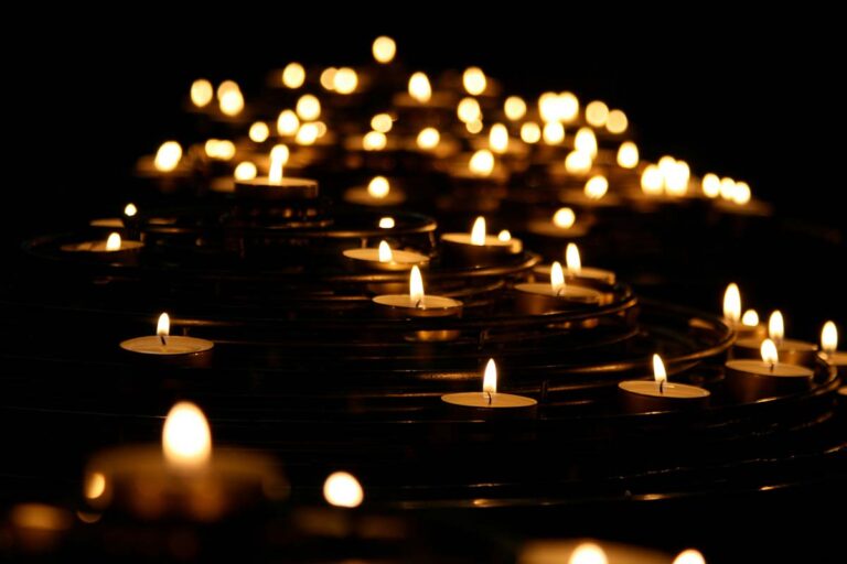 A set of lit candles as a representation of hope after a loss
