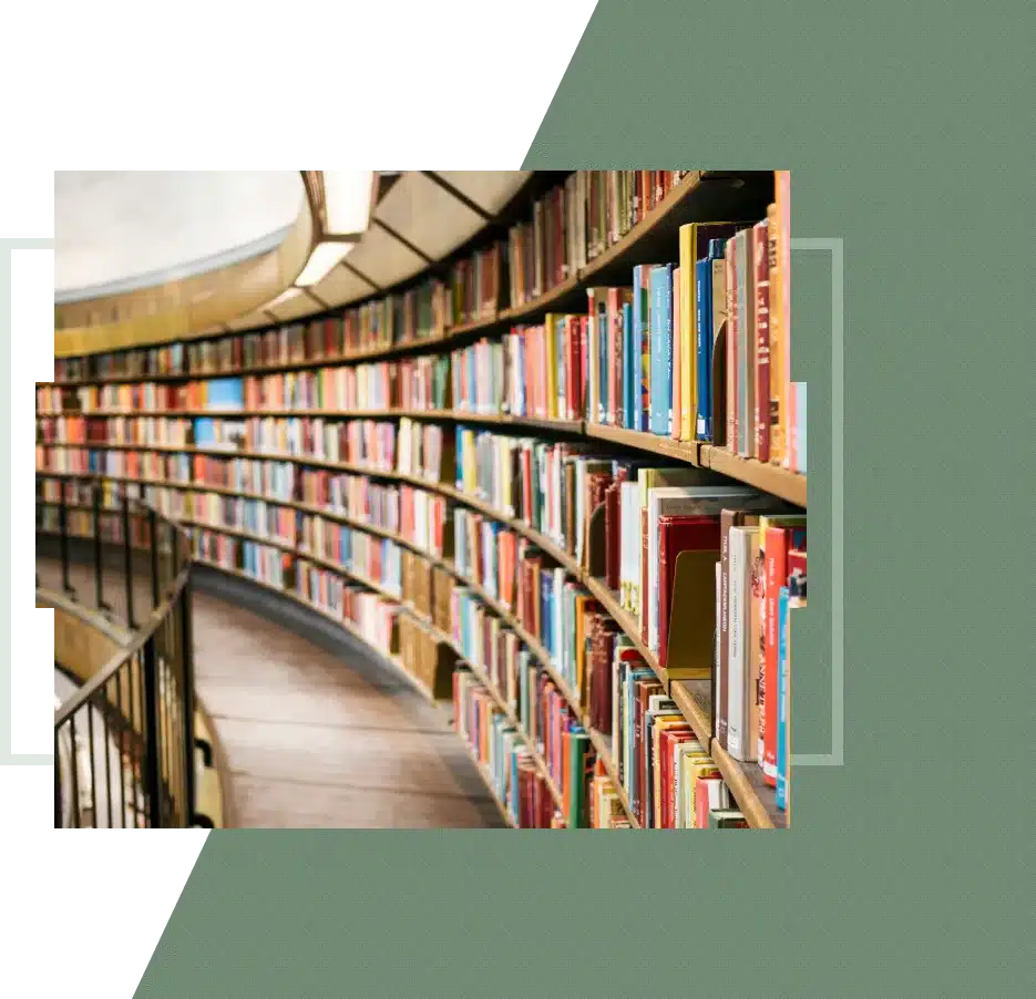 Smiling woman at a desk, representing positive outcomes from mental health services in San Francisco.