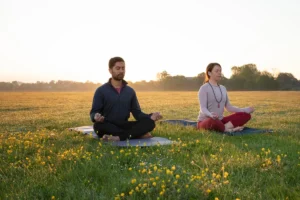 men and women meditating