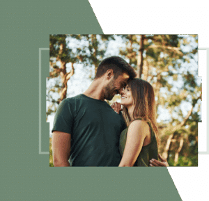 Couple embracing outdoors.