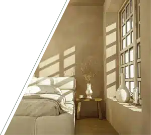 Minimalist beige bedroom with a gridded window.