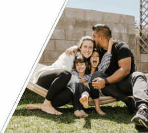 Smiling child psychologist, San Francisco, with child in therapy session, supporting emotional growth and healing care