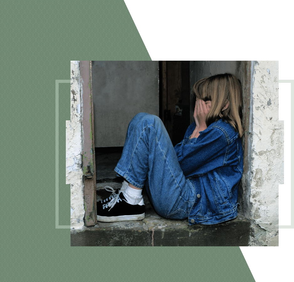  Child curled up covering face expressing distress vulnerability and need for emotional support and compassionate care