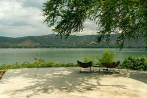 Scenic view of a lake with outdoor seating